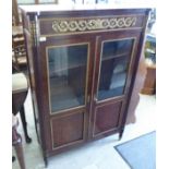 A late 19thC Continental walnut and gilt metal mounted side cabinet with outset, reeded flanks,