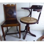A 1930s bentwood framed desk chair with a rotating seat,