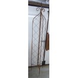 A brown painted metal three-fold garden trellis 68''h BSR