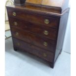 A George III ebony inlaid four drawer dressing chest,