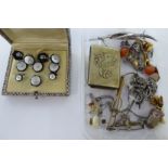 Items of personal ornament: to include a set of eight mother-of-pearl shirt studs and cufflinks