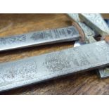 A pair of 20thC Wilkinson dress swords with wire bound handgrips and pictorially etched blades