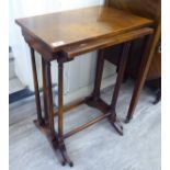 A nesting pair of modern burr walnut finished occasional tables,