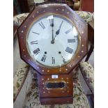 A late 19thC walnut cased drop dial clock;