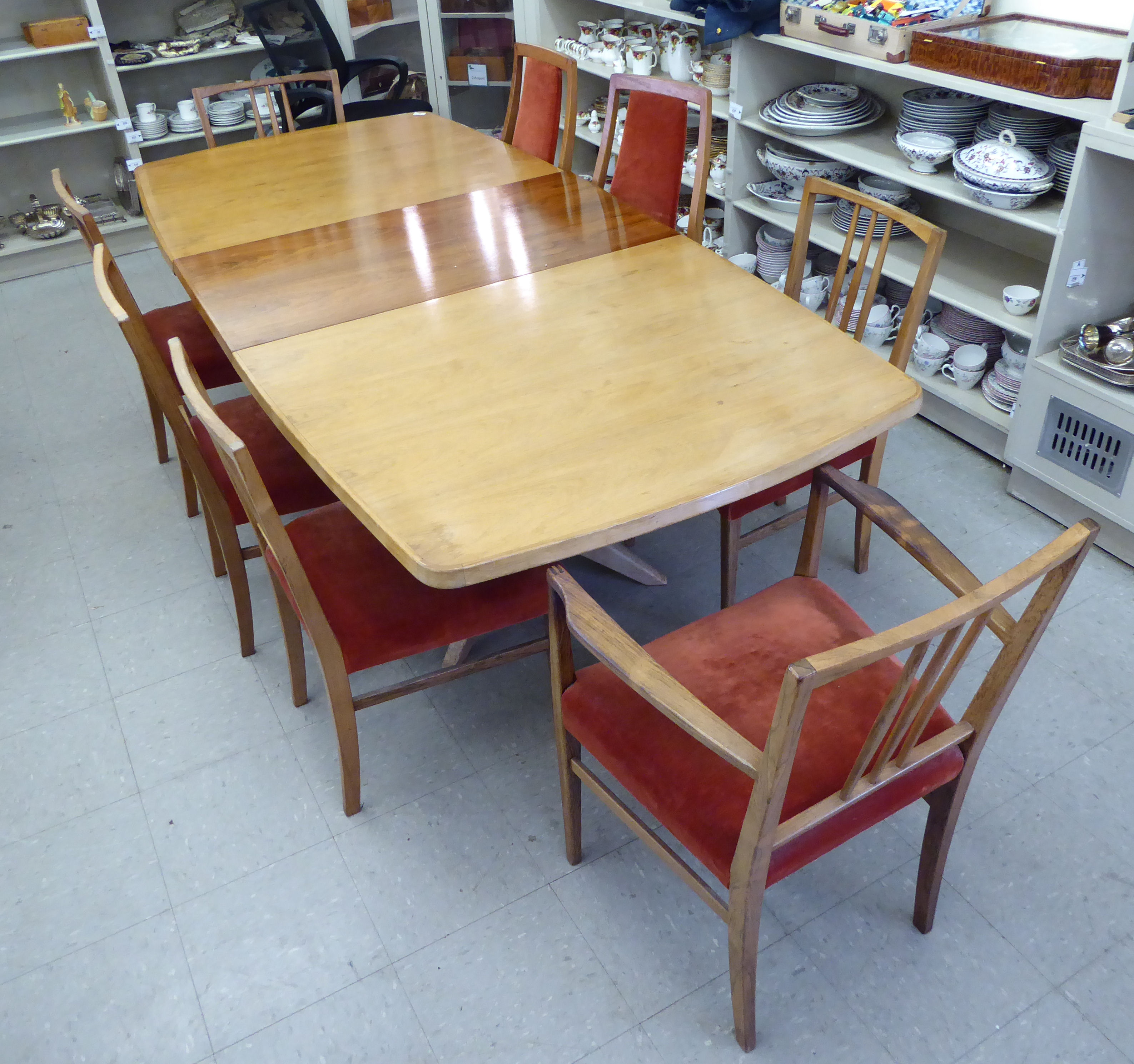 A modern rosewood dining table, the top with rounded corners, raised on a splayed underframe, - Image 2 of 3