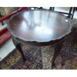 A 1930s walnut occasional table,