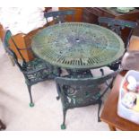 A Victorian style green painted metal terrace table,