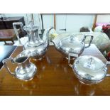A four piece Wilcox silver plated tea set comprising a teapot, coffee pot,