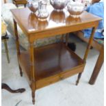 A mid/late Victorian mahogany two tier hall table with a single drawer, raised on ring turned,