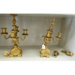 A pair of late 19thC Continental cast gilt metal candelabra,