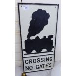 A cast iron sign 'Crossing,