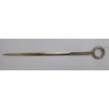 A George III silver skewer with a cast laurel wreath ring terminal indistinct London maker's mark