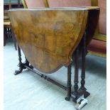A late Victorian walnut Sutherland table,