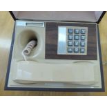 A 'vintage' Decotel box cased novelty telephone and handset,