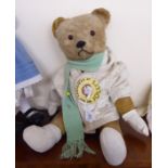 A 1930s beige mohair Teddy bear with glass eyes and mobile limbs 20''h BSR