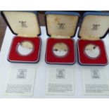 Three Royal Mint proof coins,