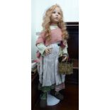 A Hilderguard Gunzel porcelain doll 'Rebecca' Limited Edition 83/200 with a certificate 28''h