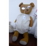 A 1950s golden mohair Teddy bear with glass eyes and mobile limbs 24''h BSR