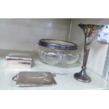 Silver/silver mounted items, viz. a loaded specimen vase of trumpet form 7''h; a cigarette box 3.