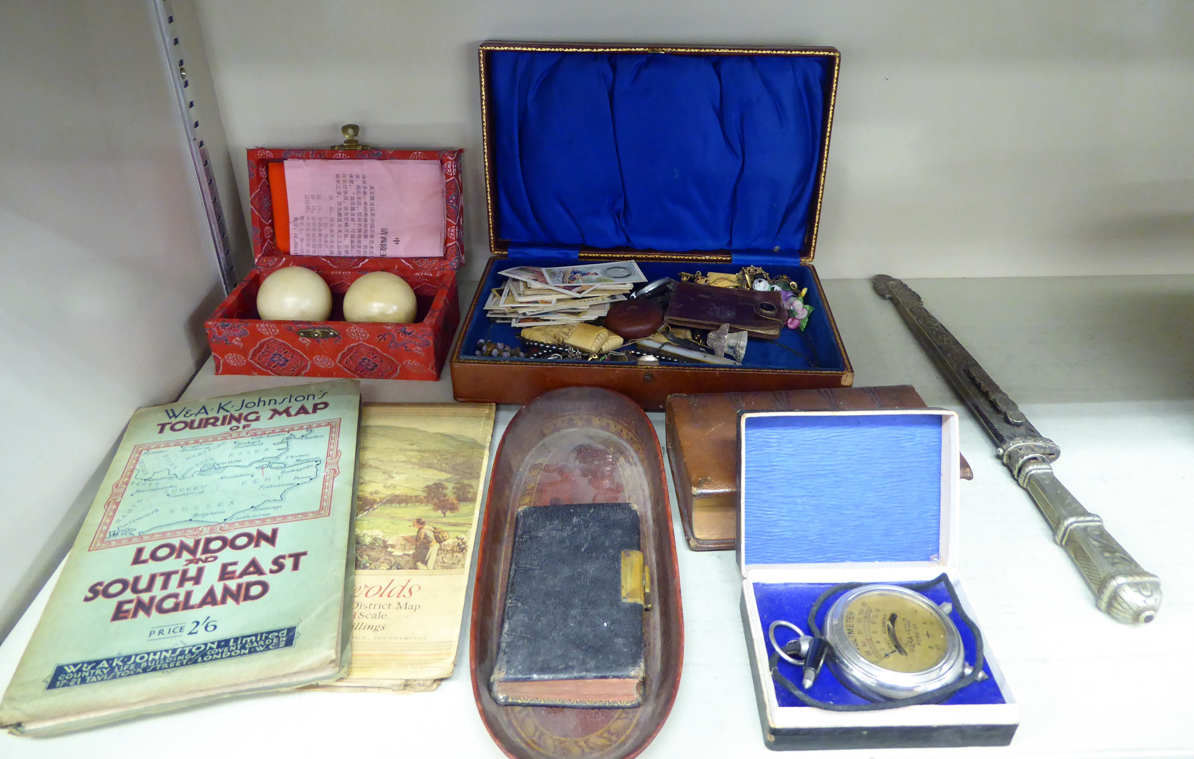 A mixed lot: to include a 19thC moulded and gilded maroon hide desk tray stamped Dyson & Benson,