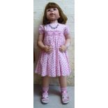 A collectors celluloid doll 34''h BSR
