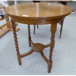 A 1930s oak hall table,