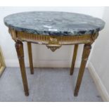 A late 19thC Continental carved giltwood oval occasional table with a mottled green marble top,