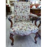 An early Victorian rosewood framed elbow chair,