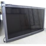A Panasonic 42'' television with remote control and wall bracket BSR