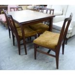 A G-Plan teak draw leaf dining table, raised on turned,