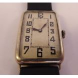 A 'vintage' silver rectangular cased wristwatch, faced by an Arabic dial,