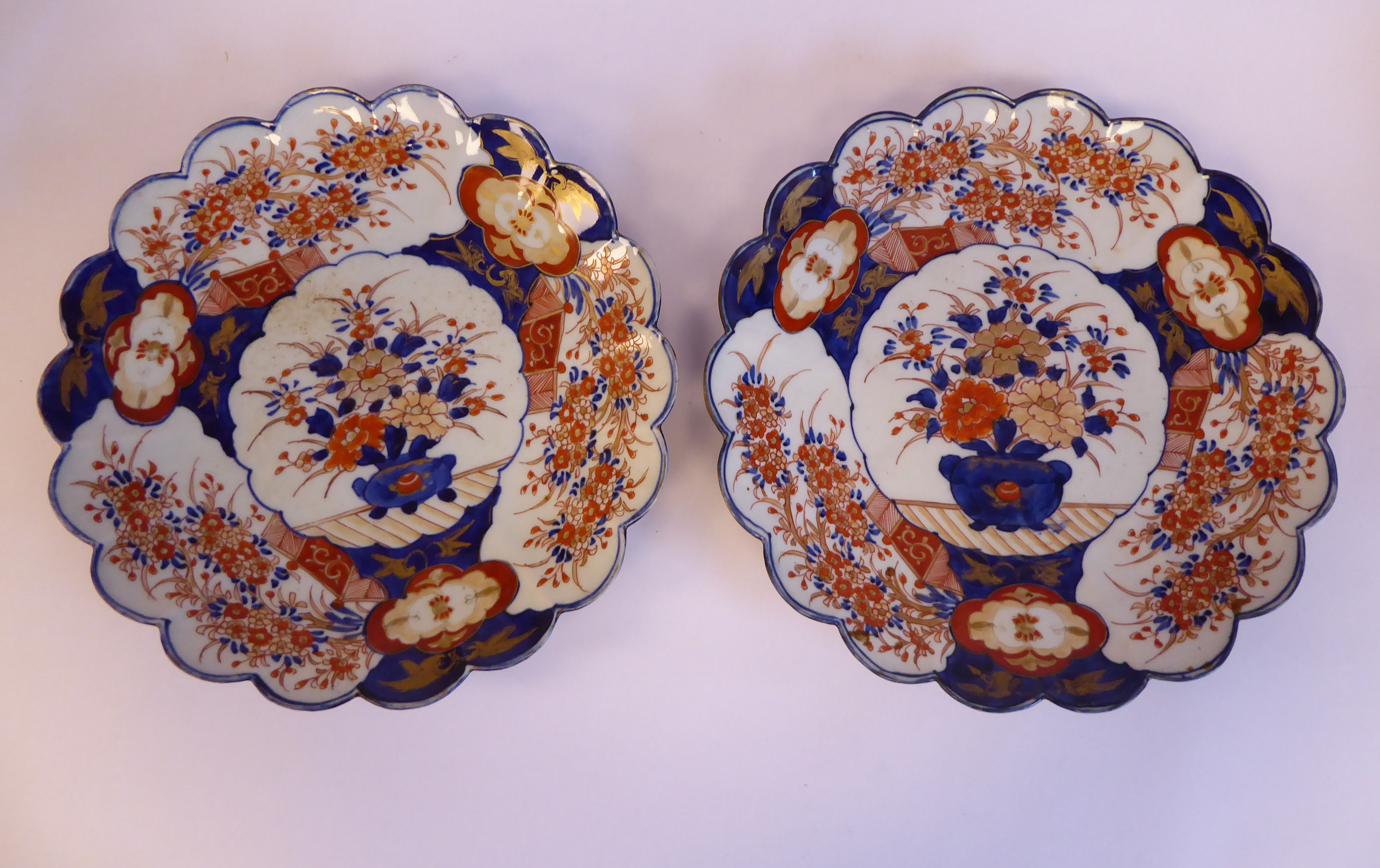 A pair of late 19thC Chinese Imari porcelain wavy edged, footed dishes,