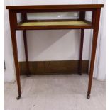 An Edwardian satinwood string inlaid and crossbanded mahogany display table,