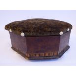 A late Victorian spittoon in the form of an octagonal mahogany footstool with inlaid border