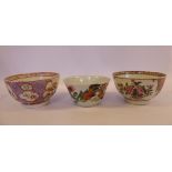 Three late 18thC Chinese porcelain tea bowls, variously decorated in the famille rose with flora,