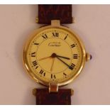 A Cartier Vermeil gold plated cased wristwatch, faced by a Roman dial, serial number 124096/590003,