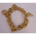 A 14ct gold chamfered, double ring link bracelet,