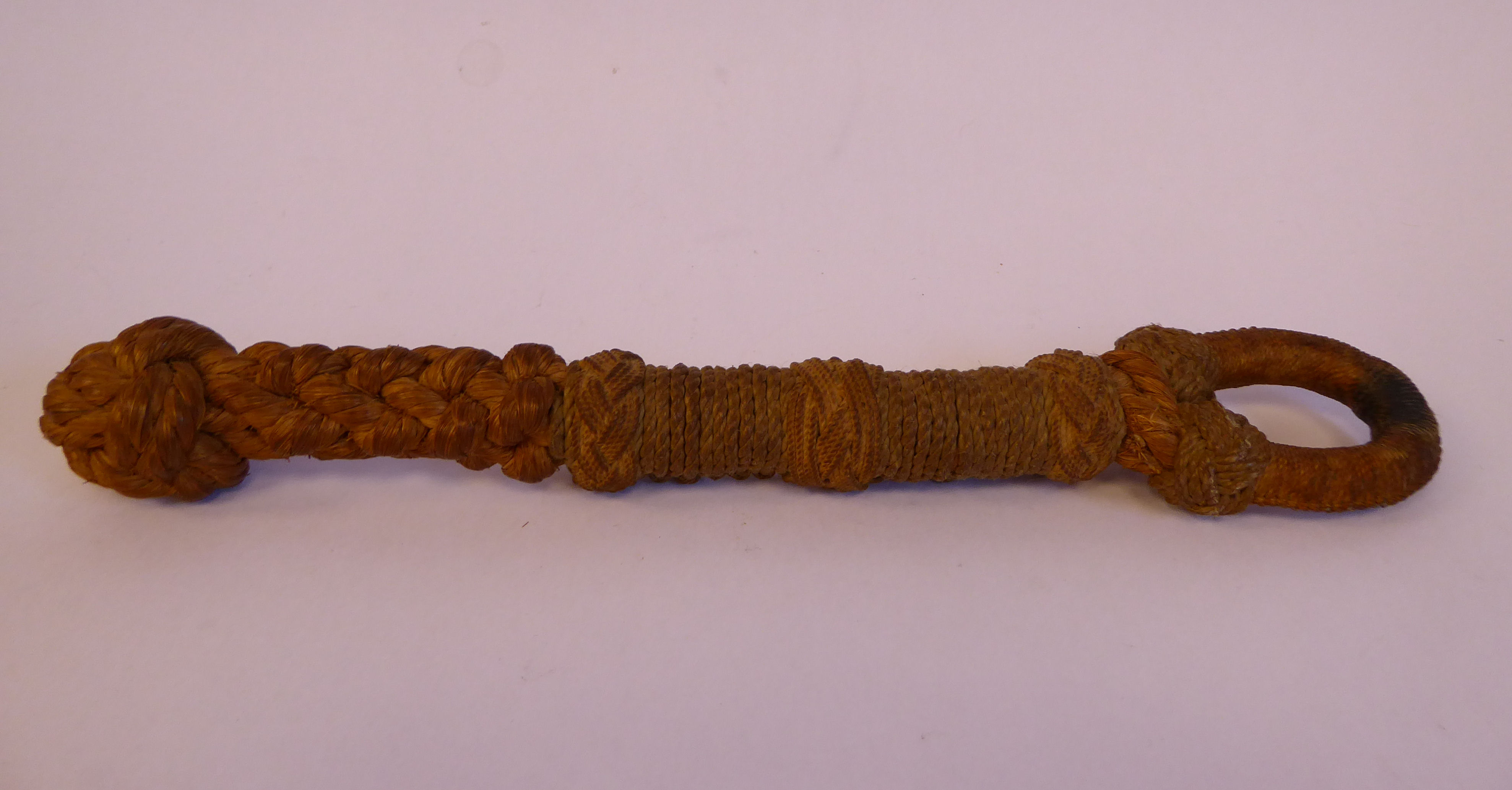 A 19thC finely woven and knotted string and rope bell pull lanyard 12''L overall