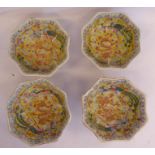 A set of four late 19thC Chinese porcelain octagonal bowls, on splayed footrims,