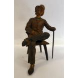 A late 19thC painted cold cast bronze figure, a bewhiskered gentleman,