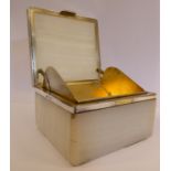 A grey onyx and silver mounted dispensing cigarette box with straight sides and a hinged lid,