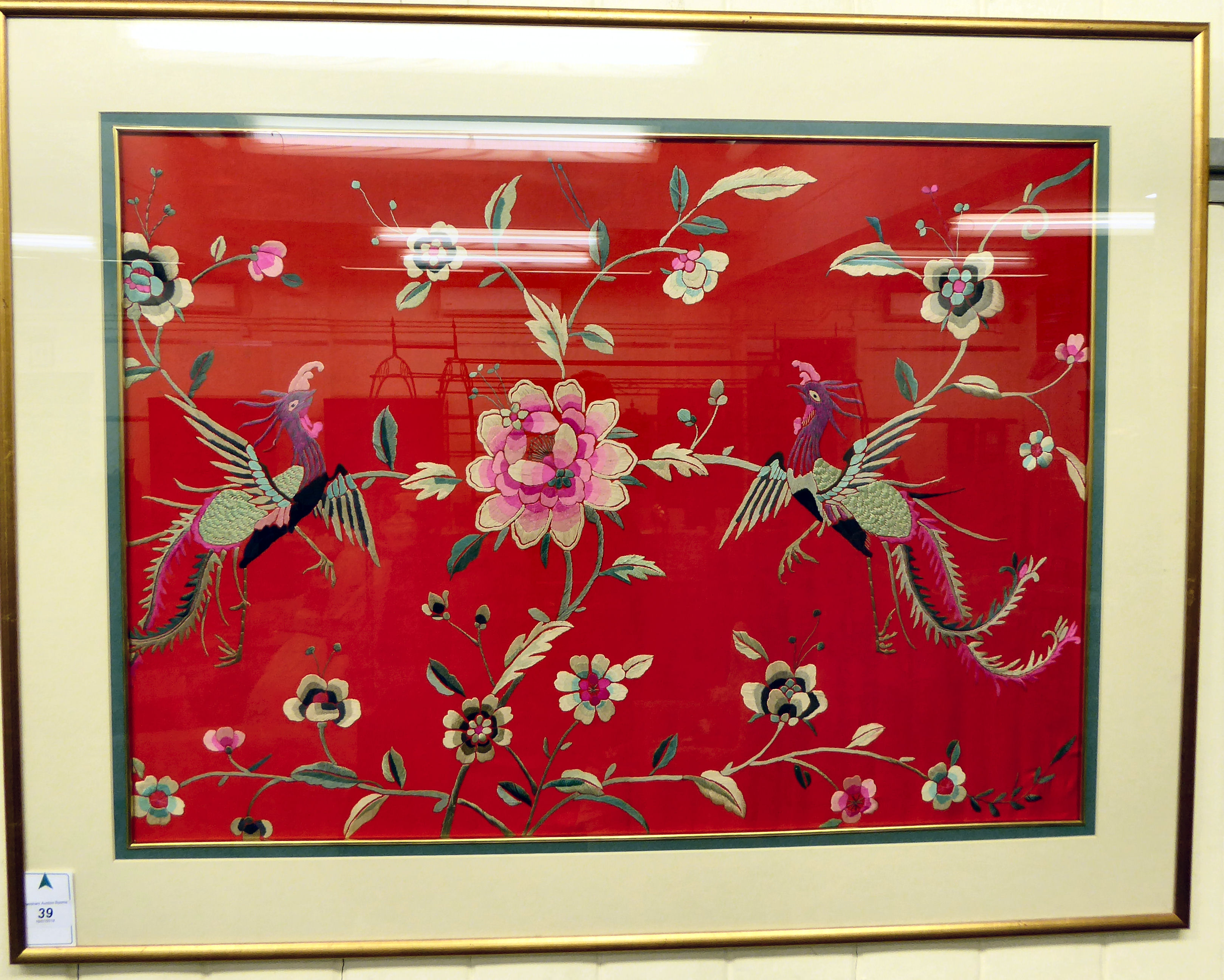 A 20thC Oriental multi-coloured tapestry picture, featuring exotic birds and flora,