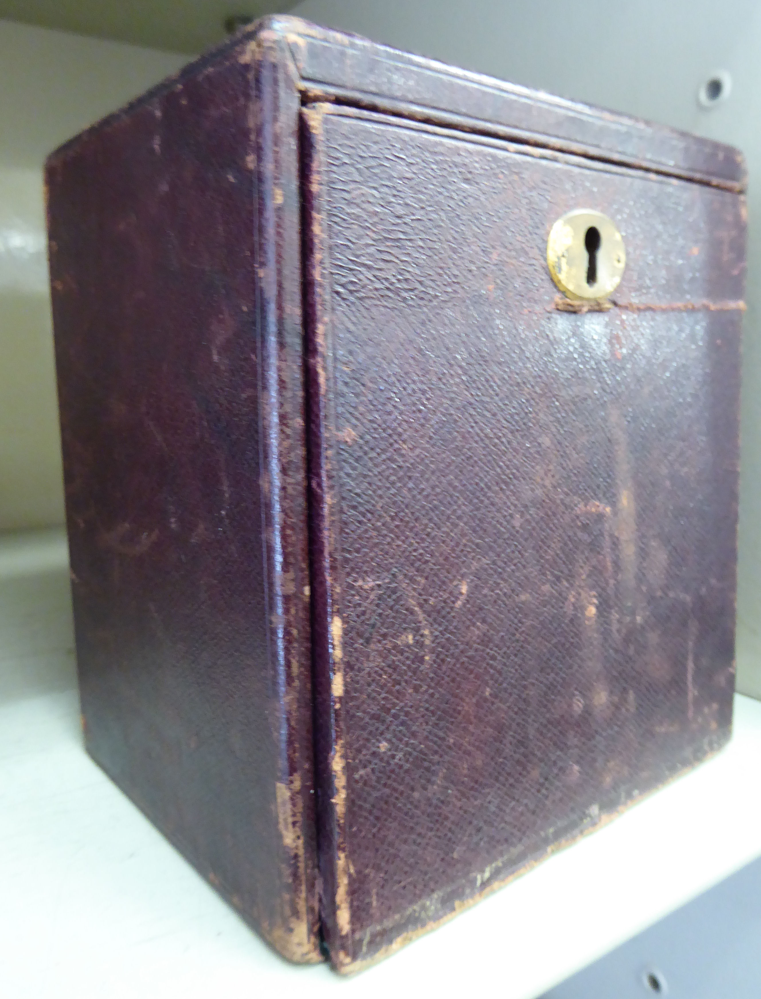 A late 19thC Melliship & Harris of London, traveller's tooled burgundy coloured hide covered, - Image 2 of 2