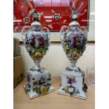 A pair of early 20thC Austrian porcelain twin handled vases,