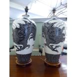 A pair of modern Oriental pottery baluster vase design table lamps,