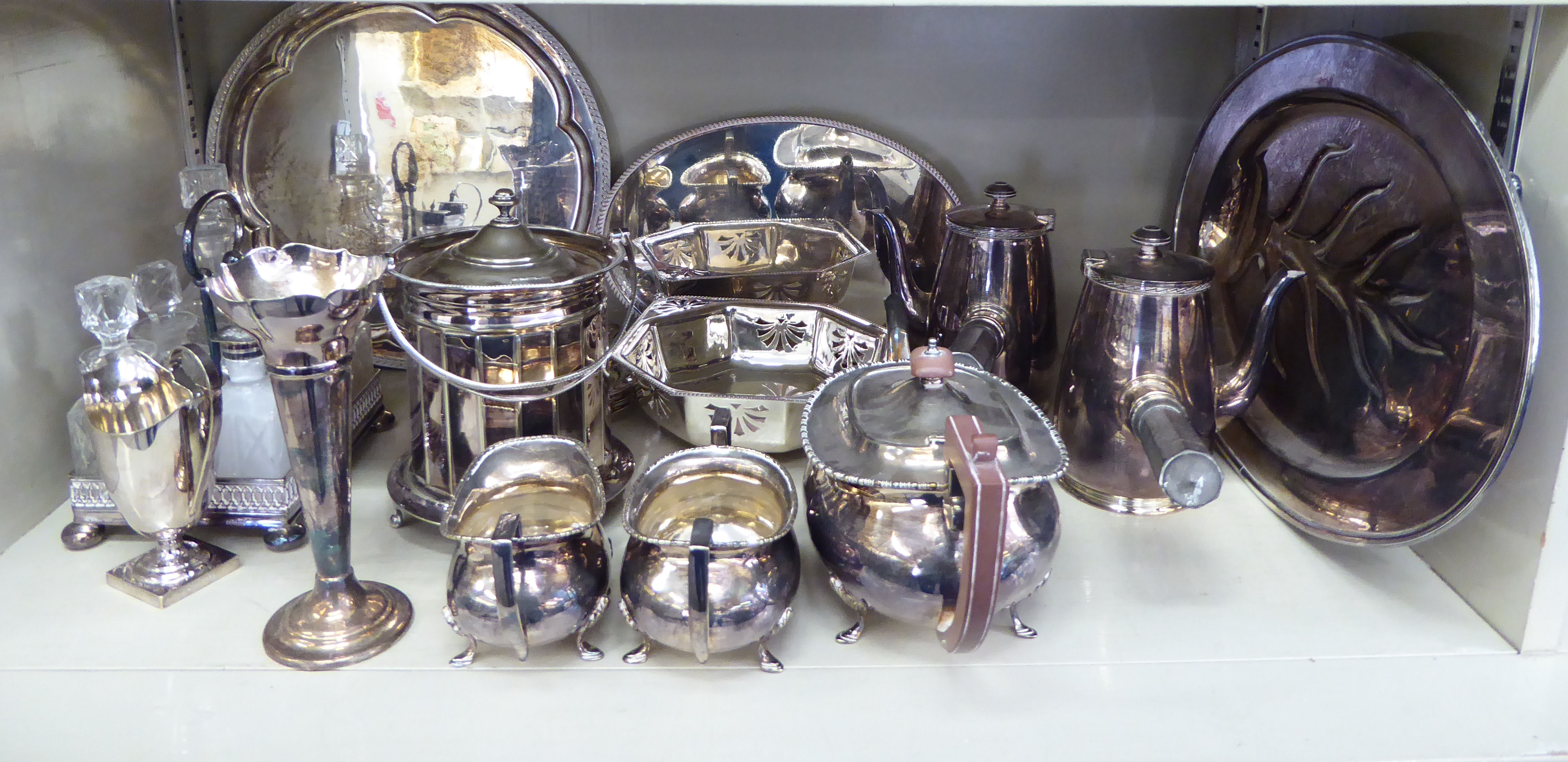 Silver plated tableware: to include a biscuit barrel with a swing handle and hinged lid OS10