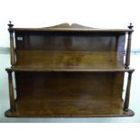 Late Victorian mahogany hanging shelves with three tiers and forward pillars,