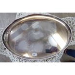 A 20thC silver plated twin pierced handled serpentine outlined serving tray,