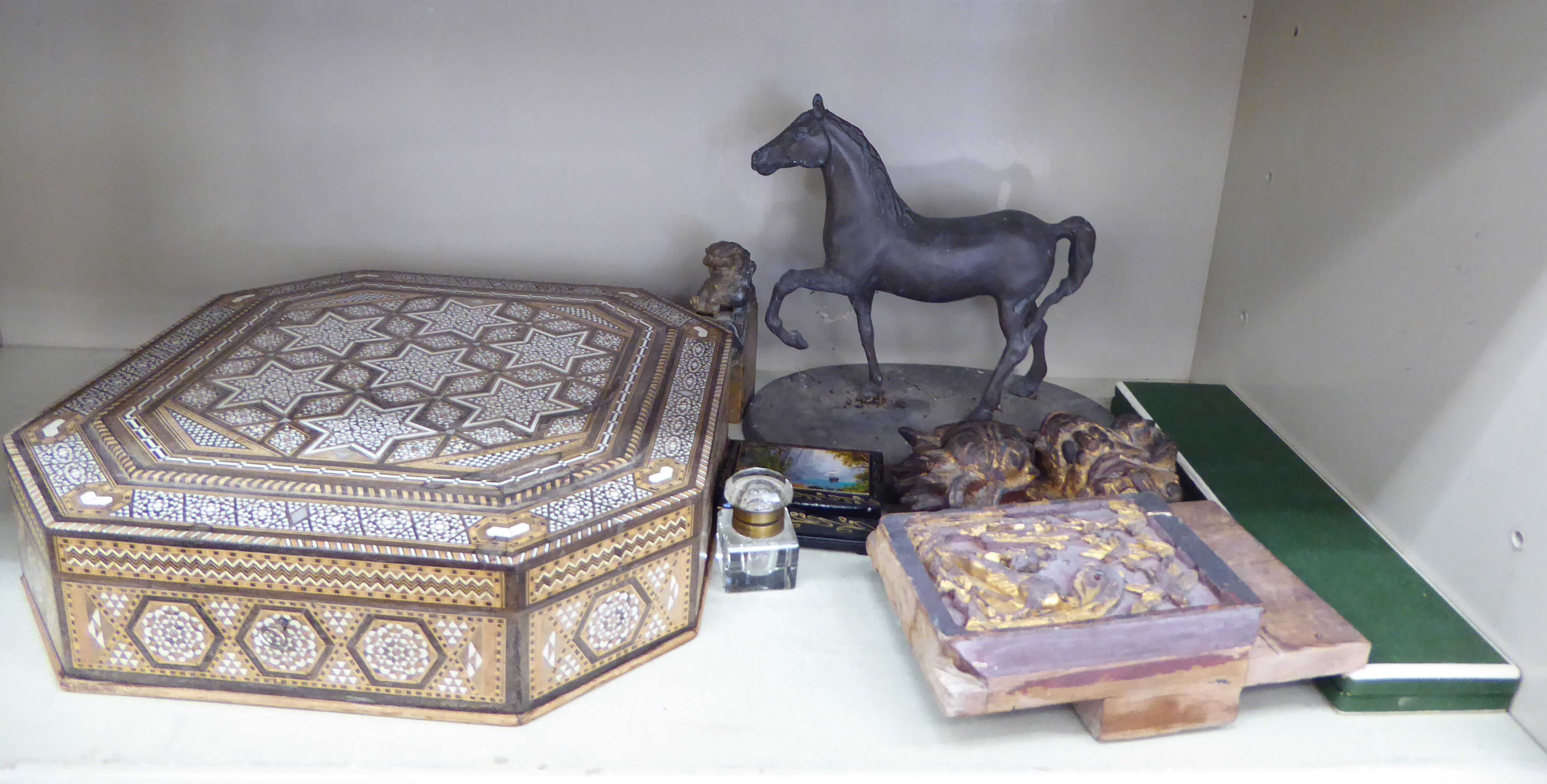 Decorative objects: to include a bronze finished model, a prancing stallion, on an oval plinth 8.