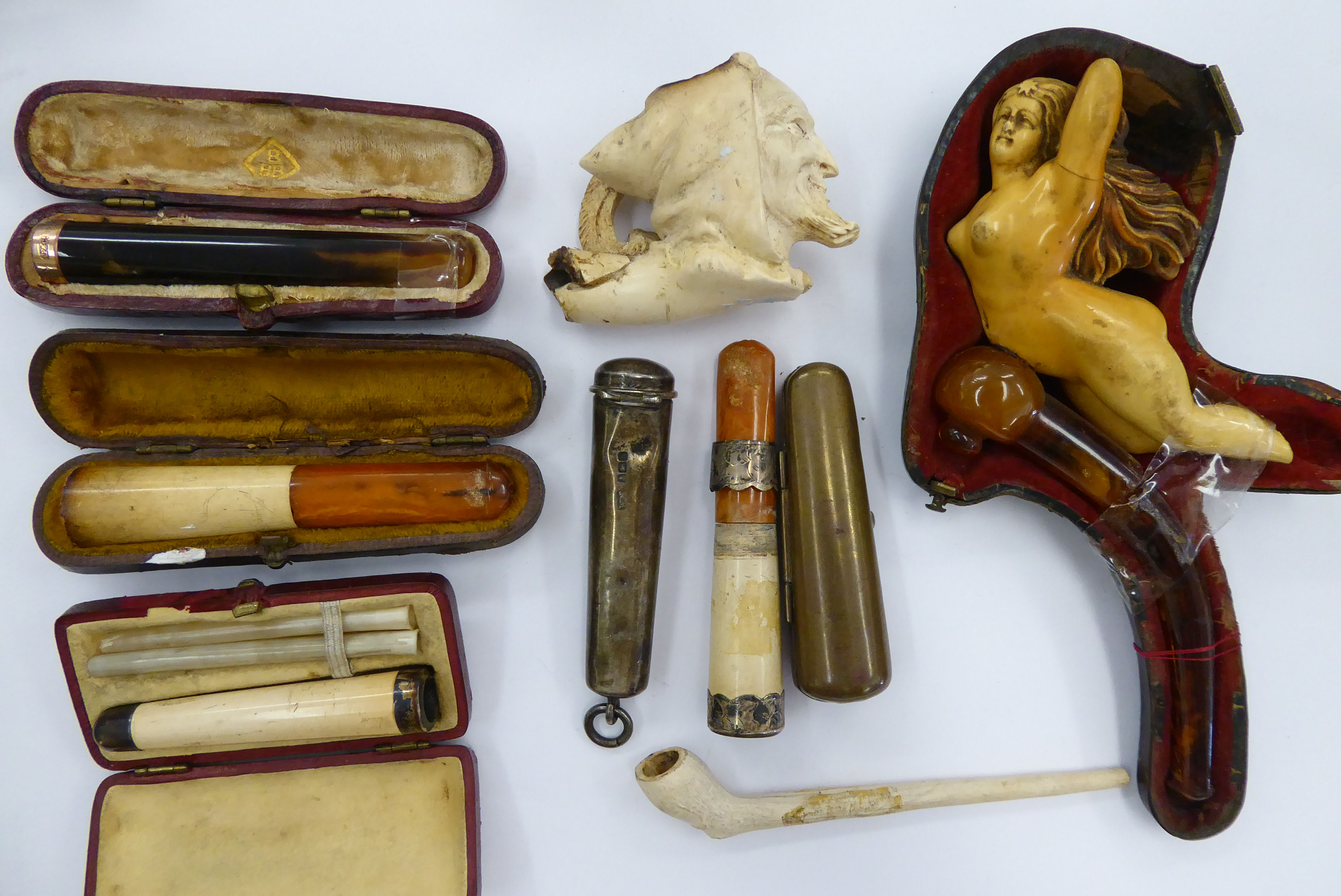 Late 19thC and early 20thC smoking related items: to include cheroot holders S